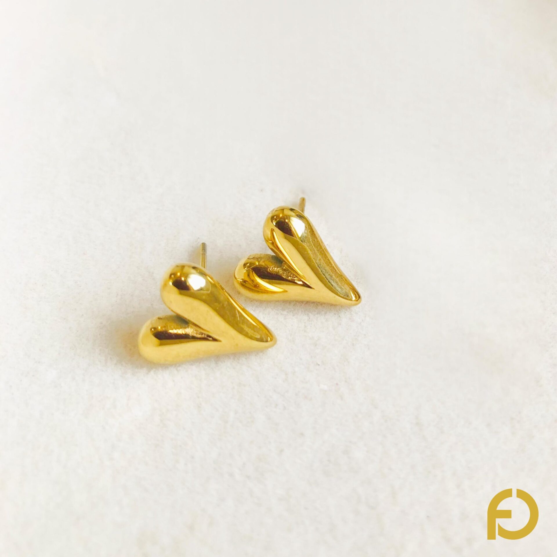 2025/11/1000122258.jpg Melting Heart Studs - Stainless Steel Jewelry in Pakistan - Fostelle